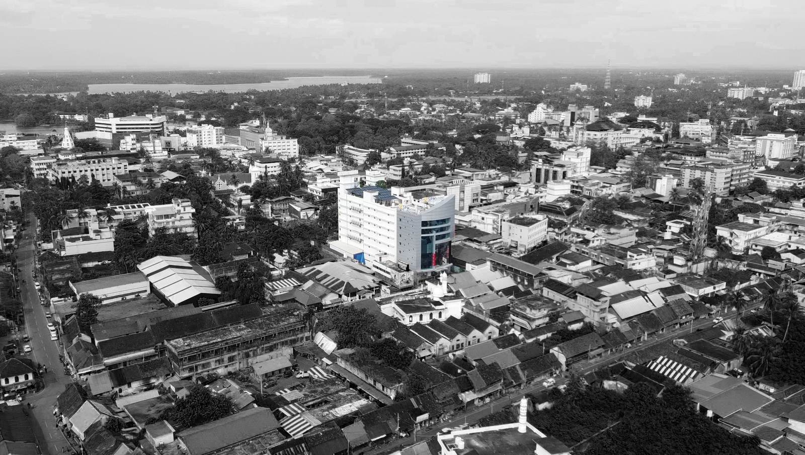 Aerial view of the SPM & Sons showroom and Kollam city